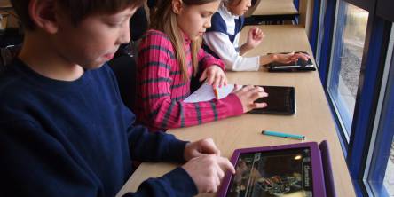 Children Using iPads at School