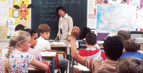 A teacher is teaching students in the class A teacher is teaching students in the class