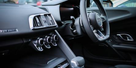 The interior of a car with right hand side driving.